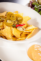 Image showing Nachos with cheese sauce and chilli pepperoni