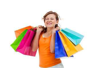 Image showing Happy attractive young shopaholic