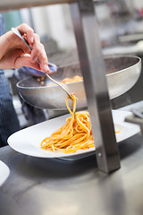 Image showing Chef plating up seafood pasta