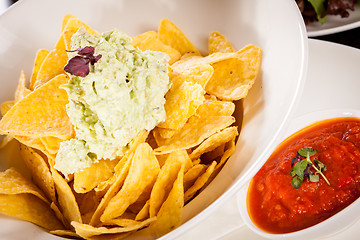 Image showing Crisp corn nachos with guacamole sauce