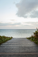 Image showing Bridge or pier across an expanse of sea