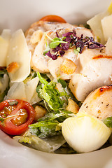 Image showing tasty fresh caesar salad with grilled chicken and parmesan 