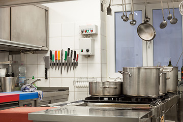 Image showing Neat interior of a commercial kitchen