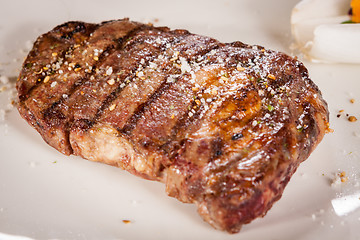 Image showing Grilled beef steak with seasoning