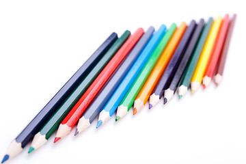 Image showing Bunch of colourful pencil crayons on white