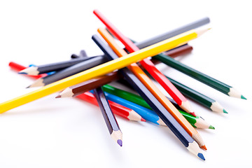 Image showing Bunch of colourful pencil crayons on white