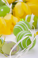 Image showing Colourful yellow and green spring Easter Eggs