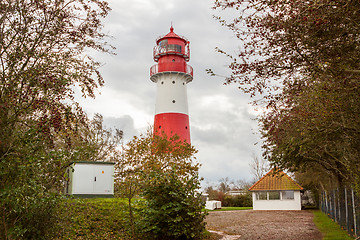 Image showing landscape baltic sea dunes lighthouse in red and white 