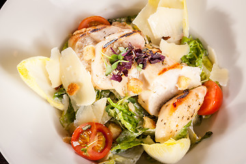 Image showing tasty fresh caesar salad with grilled chicken and parmesan 