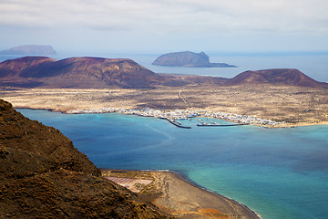 Image showing miramar del rio harbor   cloud beach      in lanzarote spain gra