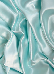 Image showing Smooth elegant blue silk as background 