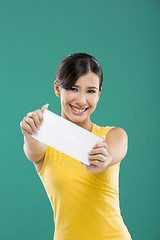 Image showing Holding  a white paper card