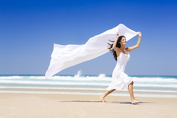 Image showing Jumping with a white scarf