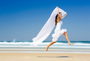 Image showing Jumping with a white tissue