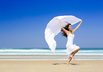 Image showing Jumping with a white scarf