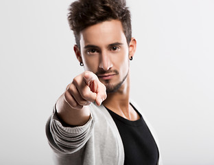 Image showing Young man pointing