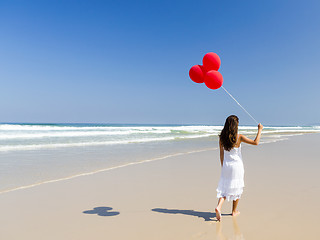 Image showing Walking with ballons