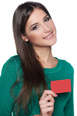 Image showing Smiling female showing blank credit card