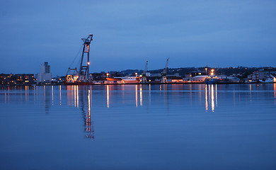 Image showing Still water at the harbour lat at night