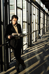 Image showing Reading businessman