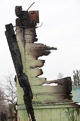 Image showing burnt wooden wall ruin