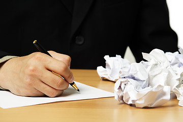 Image showing Writing businessman