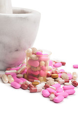 Image showing Pink pills and marble mortar