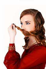 Image showing Girl with hair on mouth.