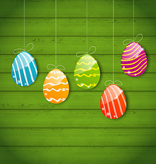 Image showing Easter colorful eggs on wooden texture