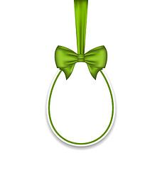 Image showing Easter paschal egg with green bow, isolated on white background