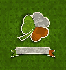 Image showing Holiday vintage background with clover and ribbon in Irish flag 