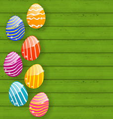 Image showing Easter colorful eggs on wooden texture