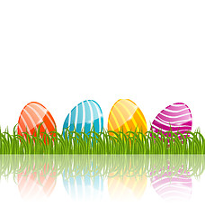 Image showing Easter traditional eggs in green grass with empty space for your