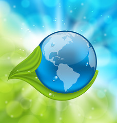 Image showing Planet Earth with green leaves