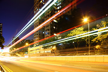 Image showing Busy traffic trail in city at night