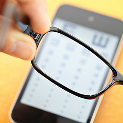 Image showing Eyechart on mobile with eyewear