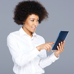 Image showing Attractive Afro-American woman with a tablet