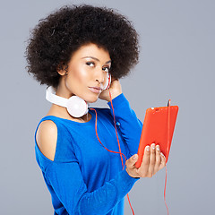 Image showing Beautiful African American woman with her music