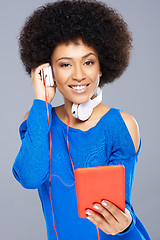 Image showing Beautiful Afro-American woman listening to music