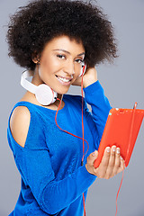 Image showing Beautiful African American woman with her music