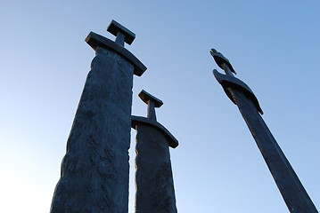 Image showing Swords in rock