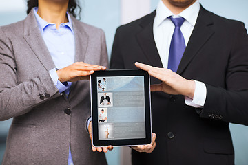 Image showing businessman and businesswoman with tablet pc