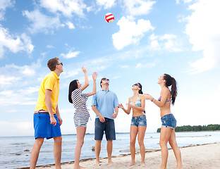 Image showing group of friends having fun on the beach