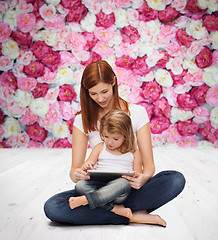 Image showing happy mother with little girl and tablet pc