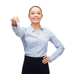 Image showing smiling businesswoman with house keys