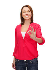 Image showing woman in casual clothes showing ok gesture