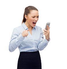 Image showing screaming businesswoman with smartphone