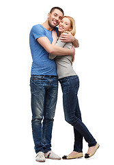 Image showing smiling couple hugging