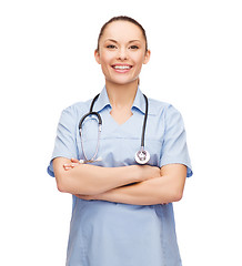 Image showing smiling female doctor or nurse with stethoscope