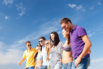 Image showing group of friends having fun on the beach